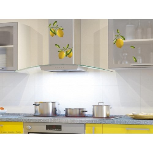 Cuisine personnalisée avec des adhésifs citrons jaunes en trompe-l'oeil. Stickers adhésif citrons jaune en trompe-l'oeil dans une cuisine jaune moderne.