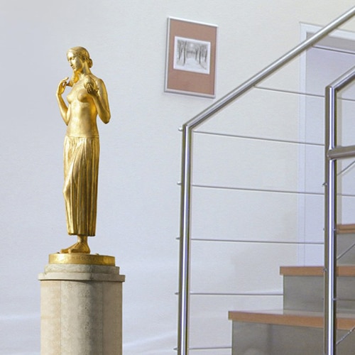 Offrez à votre intérieur une touche moderne avec le sticker superbe statue dorée ! sticker mural sculpture femme dorée