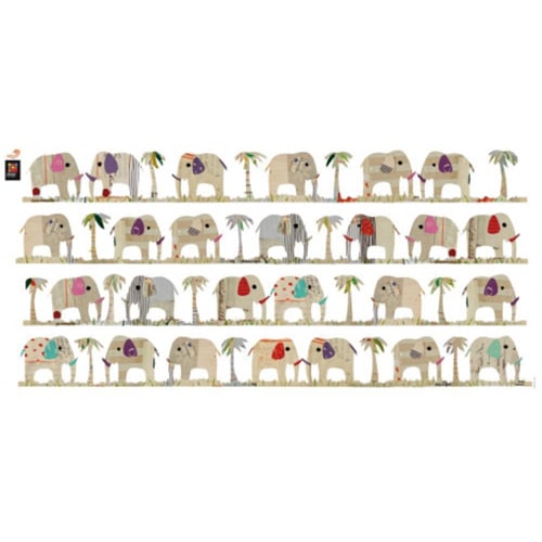 Sticker autocollant d'éléphants et dromadaires colorés sur un meuble blanc