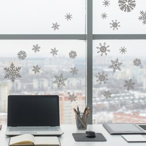 Flocons électrostatiques Argent sur une vitre d'un bureau