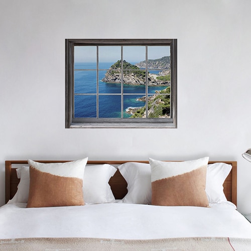 Mur d'image au bord de la mer, dans votre salon avec un canapé confortable