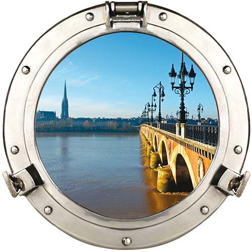 Sticker fausse fenêtre ronde avec une vue sur le Pont de Pierre comme un faux hublot de bateau en tompe-l'oeil.