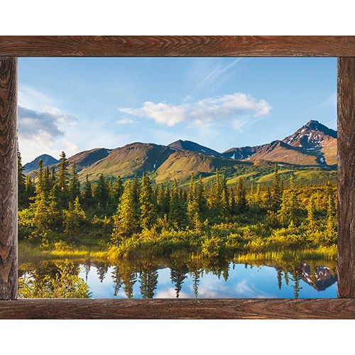 Fausse fenêtre adhésive en trompe l'oeil offrant la vue sur un paysage Canadien en montagne.