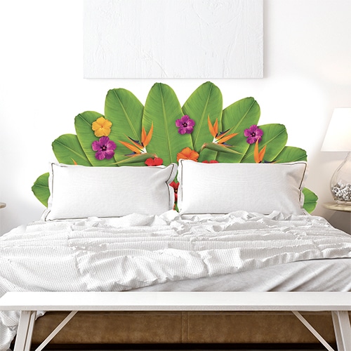 Sticker Tête de lit en forme de fleurs de Tahiti sur un mur blanc