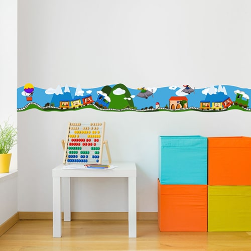 Sticker frise canards en pastique au bord de l'eau dans chambre d'enfant avec boulier et cubes colorés