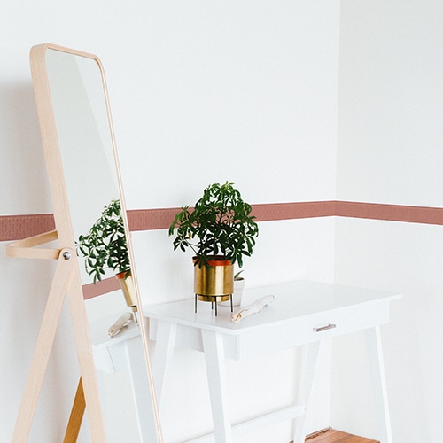 Sticker frise feuille rouge et jaune avec plante décorative et miroir