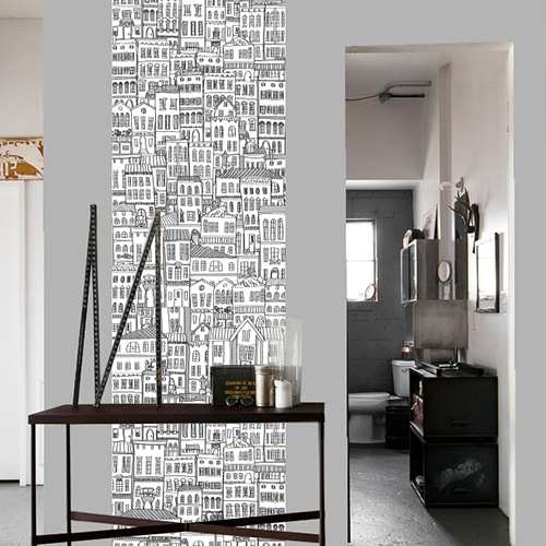Choisissez nos stickers géants à colorier Immeubles décoration mis en ambiance, 1ère proposition Autocollant mural géant immeubles à colorier mis en ambiance sur un mur gris