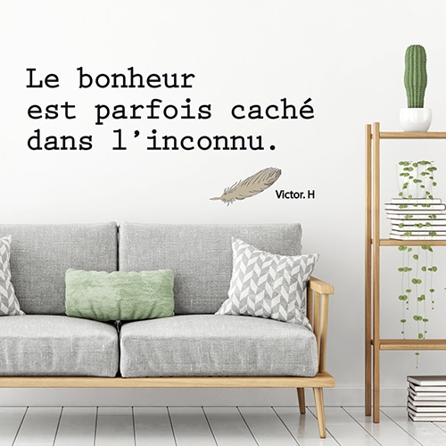 Sticker d'une citation sur le bonheur dans un salon