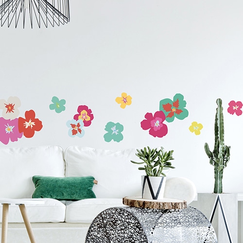 Stickers mural Orchidées sur un mur blanc dans le salon