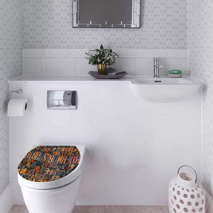 Sticker autocollant pour WC motif géométrique bicolore collé sur un WC classique
