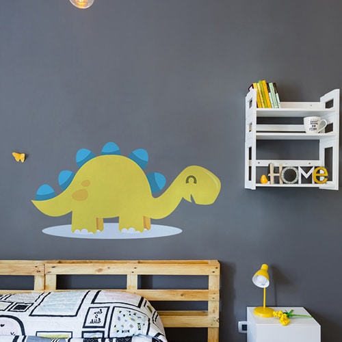 Sticker Dinosaure Bleu pour enfants mis en ambiance dans une chambre d'enfants avec bureau