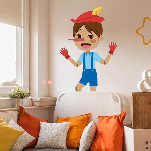 Sticker mural Pinocchio pour enfants mis en ambiance dans une chambre aux murs clairs