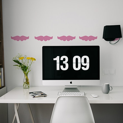 Stickers muraux moustache rose frise pour bureau