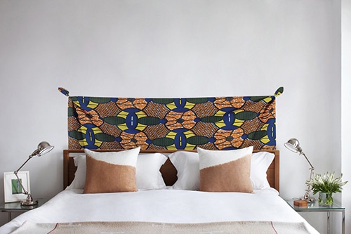 Sticker planche Etoiles dorées au dessus d'un lit