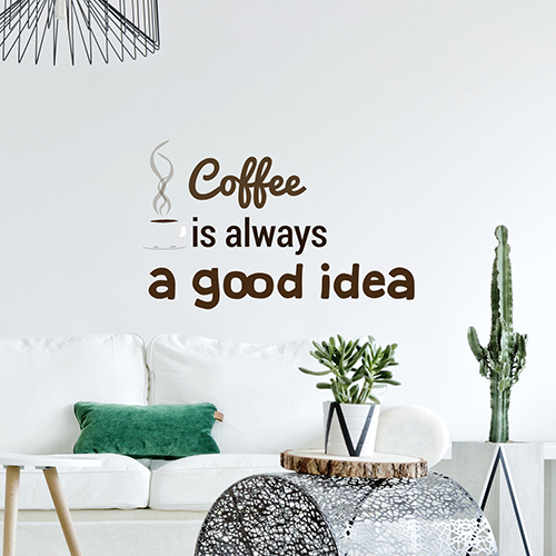 citation autocollante coffee is always a good idea collé au mur d'un salon moderne
