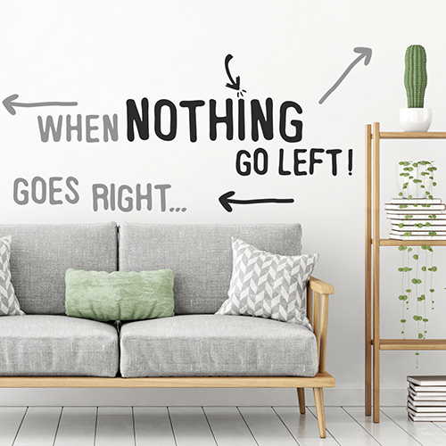 Sticker mural autocollant citation When Nothing collé au mur d'un bureau