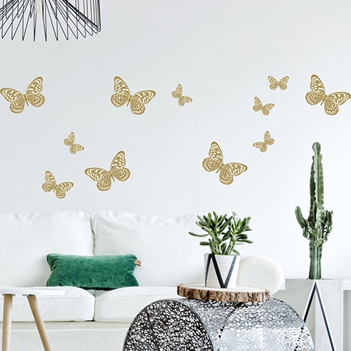 Stickers planche Papillons au dessus d'un canapé