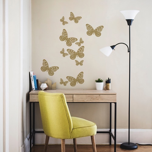 Sticker adhésif Papillons au dessus d'un bureau