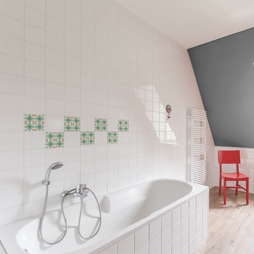 Autocollant décoration ciment vert et orange pour carrelage de salle de bain avec baignoire