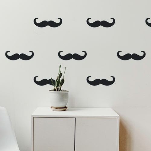 Frise murale noire composée de moustache en croc