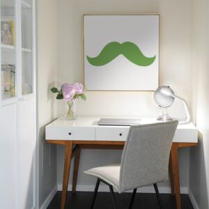 sticker mural moustache verte collé sur un tableau mural