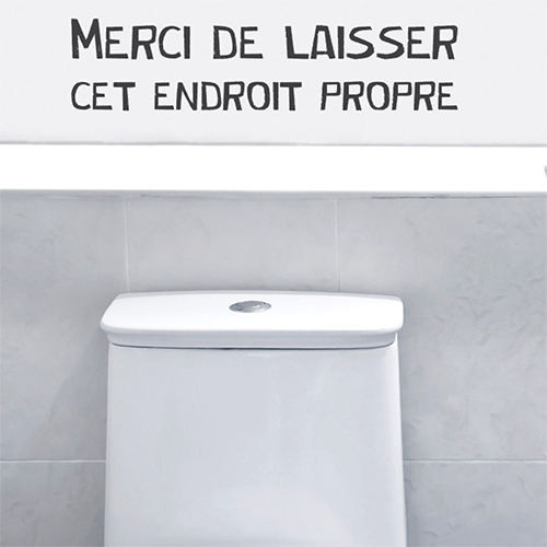 Sticker autocollant citation Merci de laisser cet endroit propre collé sur le mur de WC modernes