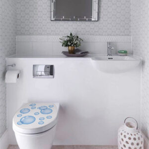WC blanc orné d'un sticker décoratif adhésif motif bulles d'eau