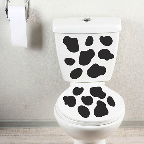 Décoration pour WC motif Vache collée à des WC