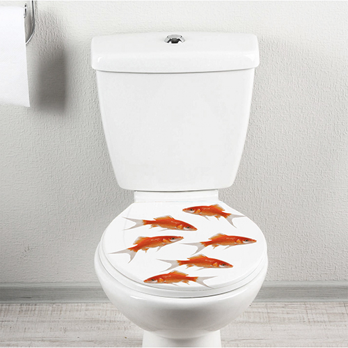 Autocollant décoratif pour WC Banc de poissons rouges posé sur l'abattant