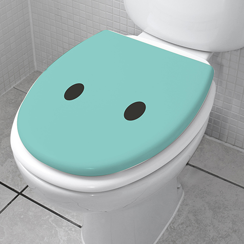 Sticker déco pour salles de WC de la gamme Smiley surpris turquoise collé sur les toilettes