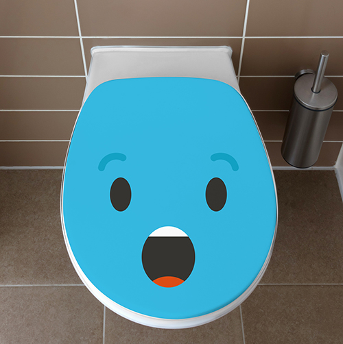 Sticker pour WC de la gamme Smiley : Smiley étonné bleu collé sur des toilettes