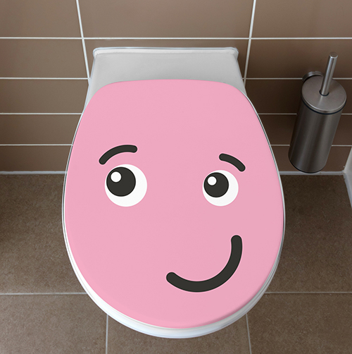 Smiley Rose Taquin collé sur un WC