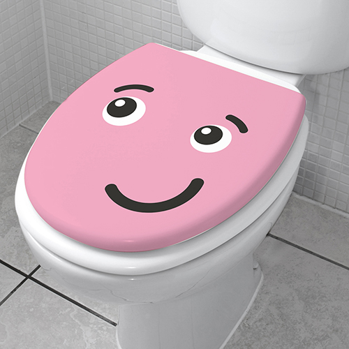 Abattant de toilette décoré avec un Smiley Taquin Rose de la gamme Smiley