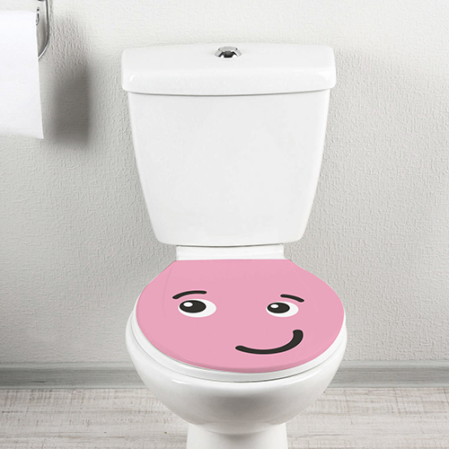 Toilette décoré d'un sticker WSH Smiley Taquin Rose vue de face