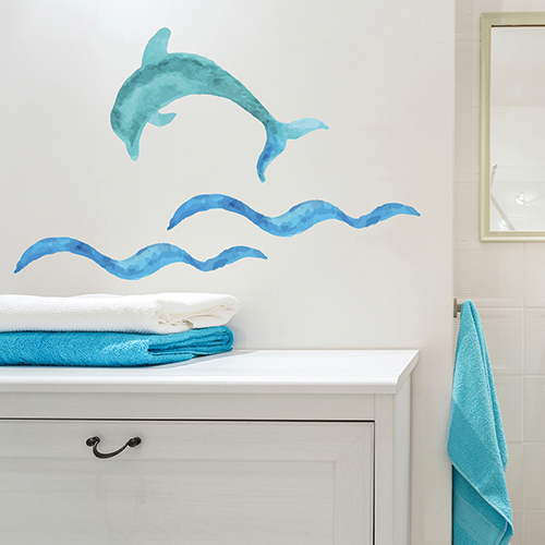 Sticker dauphin bleu au dessus d'un meuble de salle de bain moderne
