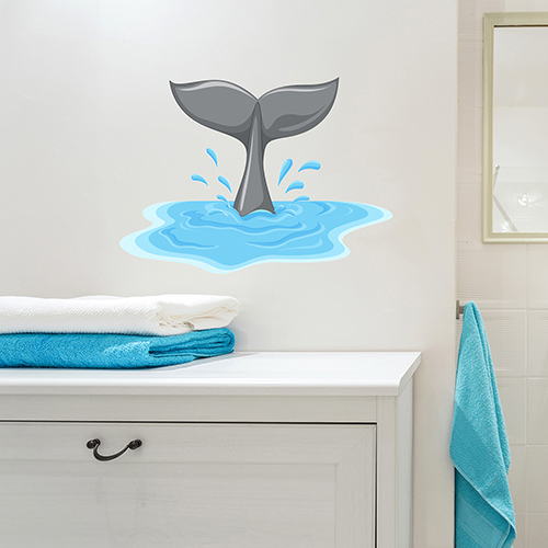 sticker queue de dauphin sur mur de salle de bain au dessus d'un meuble