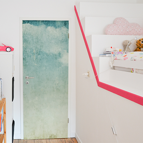 Sticker adhésif décoratif collé sur la porte d'une chambre pour enfant modèle mer turquoise