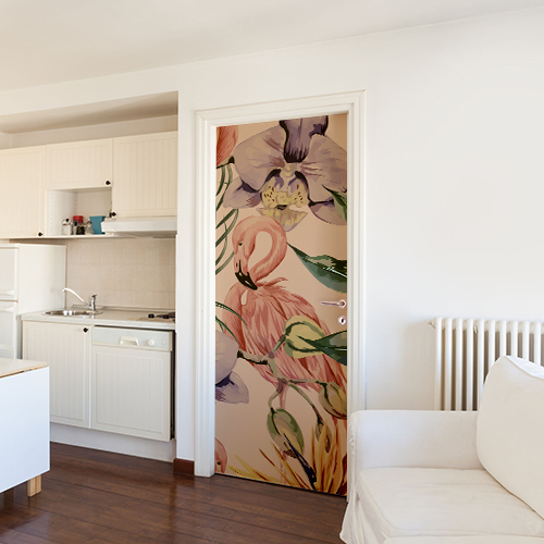 Salle de séjour blanche avec un sticker flamand rose créant le contraste collé sur la porte