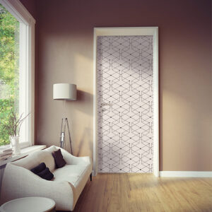 Pièce à vivre moderne éclairée dont la porte est mise en valeur par un sticker géométrique blanc et noir