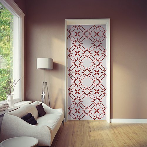 Pièce à vivre moderne et originale avec un sticker autocollant imitation céramique blanc et rouge sur la porte