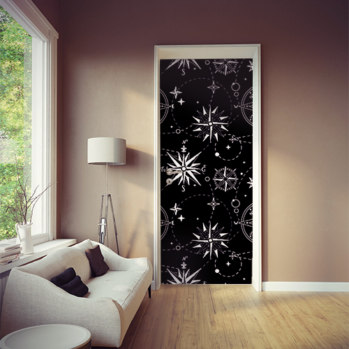 Sticker autocollant décoratif mosaïque de roses des vents blanches sur noir collé sur la porte de la pièce à vivre