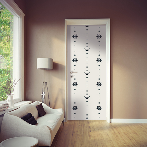 Pièce à vivre moderne décorée avec un sticker autocollant marin frise d'ancres sur fond blanc collé sur la porte
