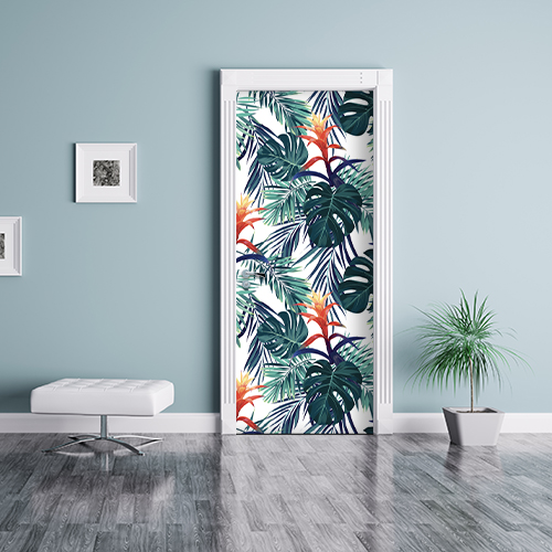 Séjour moderne décoré avec un adhésif déco pour porte et placards exotique motif monstera et fleurs.