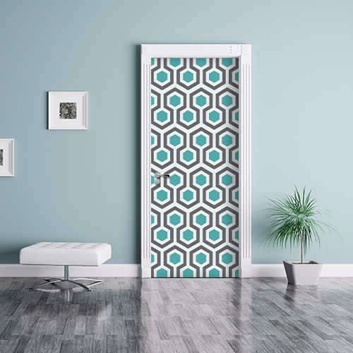 salle de séjour avec porte personnalisée par un adhésif déco de portes et placards au motif art déco nid d'abeille bleu canard et gris.