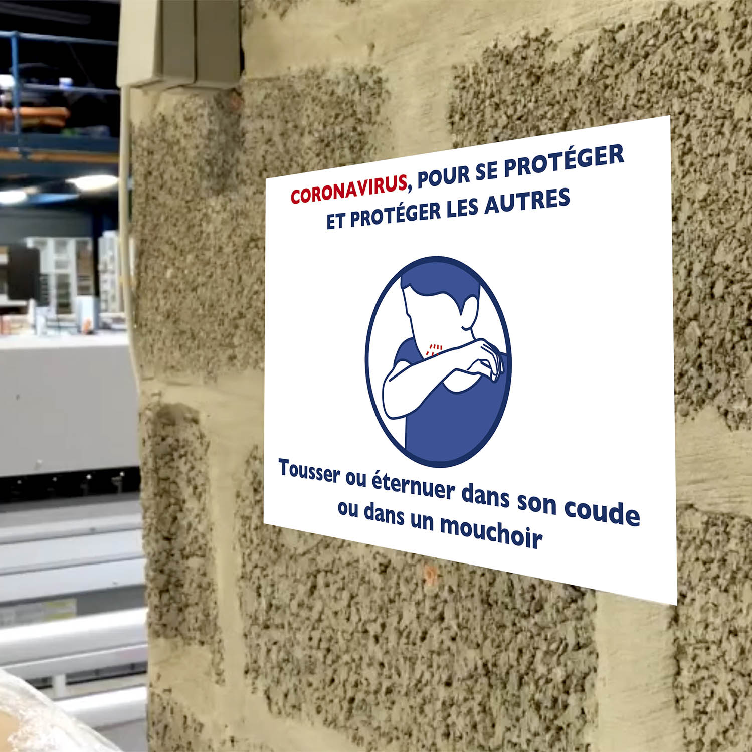 affiche tousser dans son coude collée sur un mur