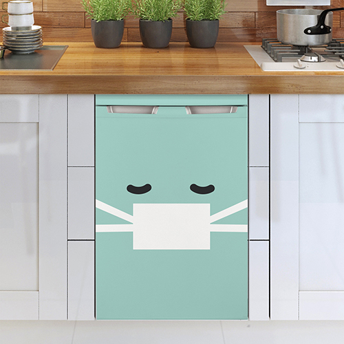 Lave vaisselle blanc orné d'un sticker smiley malade turquoise