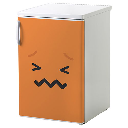 Sticker autocollant smiley tracas orange collé sur un petit frigo